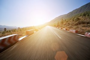 road-with-vanishing-point-at-sunset_1312-1